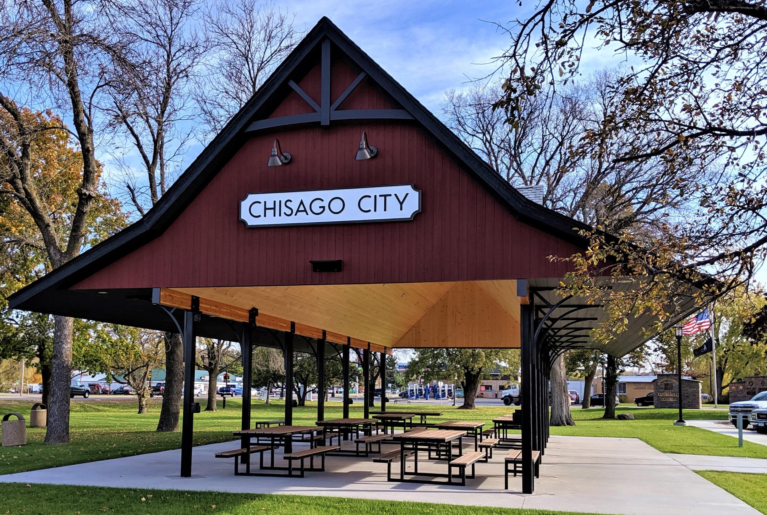 Covered picnic pavilion with Chisago City sign